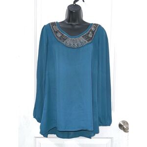 Studio Y blue tunic top featuring a silver-beaded neckline